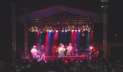 Chris LeDoux concert 2004 β outdoor stage with Tradewind truss roof and lighting