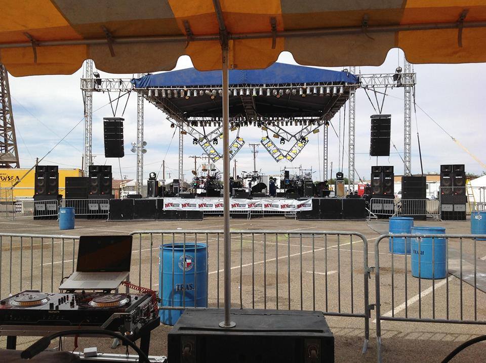 Outdoor concert staging with roof system and truss by Tradewind Sound